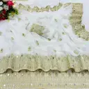 BEAUTIFUL SAREE with golden stone and mirror finished border for women in white colour .webp