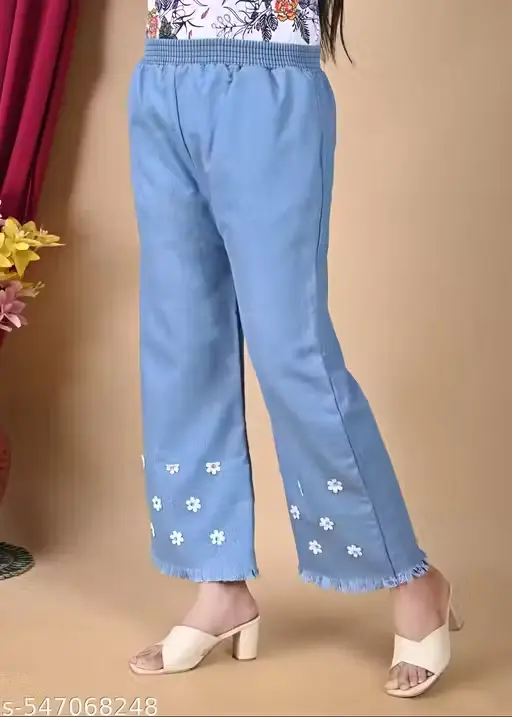 Stylish kids jeans with lose bottom design, denim jeans fabric build and classic blue colour