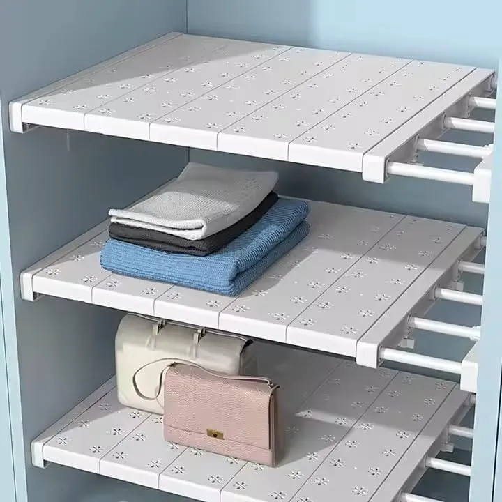 Adjustable cupboard seperator