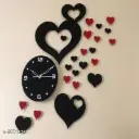 Beautiful wall clock with designed sticking shapes