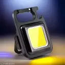 Keychain LED light with metal body, bottle opener, magnetic attachment, and different light mode 